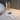 Modern bathroom counter with sculpting tool gua sha, hand cream and soap bottles