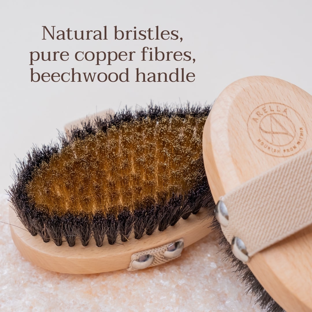 Arella body brush showing natural bristles, copper fibres and a beechwood handle