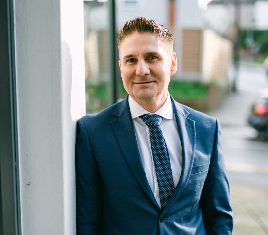 Portrait of Dr Ioannis Liakas in a suit